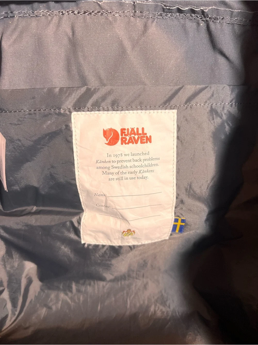 Fjallraven Kanken Backpack in Charcoal with Red Logo